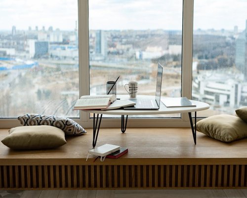 An open workspace with natural lighting reflecting a calm moment during a busy weekday afternoon